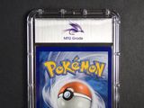 pokemon trading card case with a pokemon figure inside of it