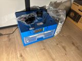 a blue machine that is sitting on the floor