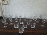 a lot of wine glasses sitting on a table