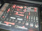 many tools in a tool box on the table