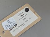 a label on a piece of paper on a table
