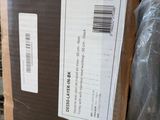 boxes are stacked on top of each other in a warehouse
