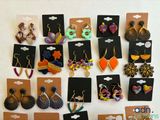 many pairs of earrings that are on display for sale
