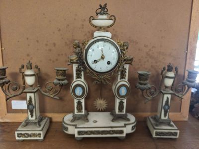 a clock that is sitting on top of a table