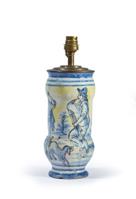 a blue and white vase with a horse on it