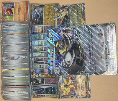 beaucoup de cartes pokemon différentes sur la table