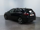 a picture of a black car parked in a room