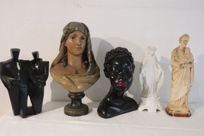 three busturines of women and a man on a shelf