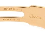 an image of a close up of a gold plated knife on a white surface