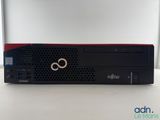 a close up of a desktop computer sitting on a table