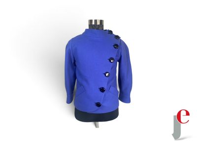 blue jacket with black buttons on a mannequin dummy