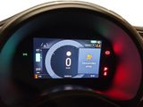 the dashboard of a car with a digital display on the dashboard