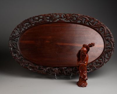 an image of a wooden plaque with a bird on it