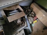 a pile of assorted items sitting on the floor