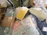 a pile of clothing and other items that are in a box