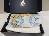 a box that has a pair of shoes in it