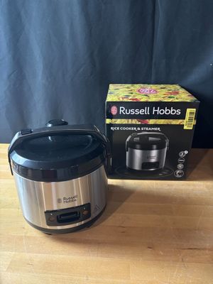 a close up of a box and a crock pot on a table