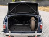an image of the back of a car with its trunk open