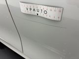 a close up of a sticker on the side of a car