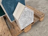 two pieces of wood are stacked on top of each other on a pallet