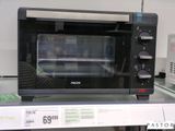 une photo d'un four grille-pain exposé dans un magasin