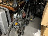 a bike that is sitting in a room with many boxes