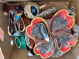 a cardboard box filled with different types of shoes