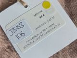 a label on a piece of clothing that is hanging on a string