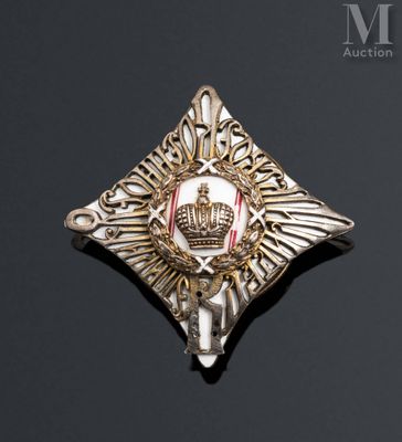 a close up of a badge on a black surface