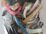 a bag of assorted watches and watches in it