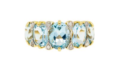 a three stone aquamarinee and diamond ring