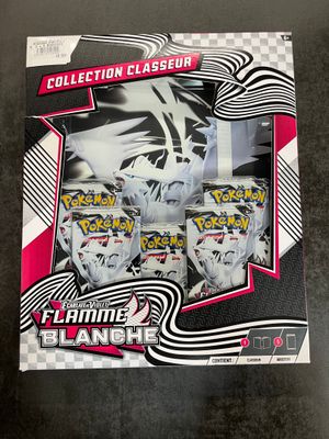 a close up of a box of pokemon cards on a table