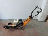 a small machine that is sitting on the floor