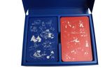 two cards in a blue box with a red one and a blue one