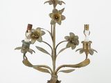 brass candelier with flowers and candles on a white background