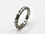 a close up of a ring on a white surface