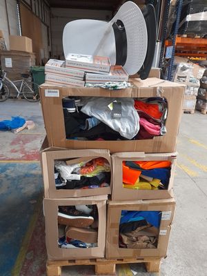 a stack of boxes with a hat on top of it