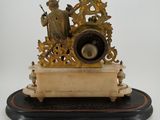 a clock that is sitting on top of a table