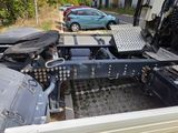 an image of a truck with a flat bed in the back of it