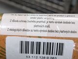 a close up of a barcode on the side of a roll of bread
