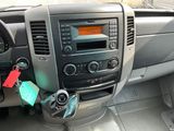 a dashboard of a car with a clock and a key in it