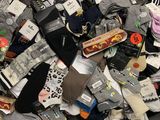 a pile of socks that are on a table