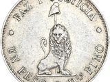 un gros plan d'une pièce de monnaie sur laquelle est représenté un lion