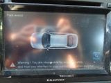 a picture of a car on the display in the car