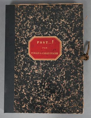 a black and red book sitting on top of a table