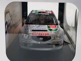 a model of a car in a box on a table