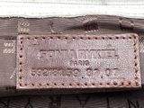 an image of a close up of a bag with a name tag on it