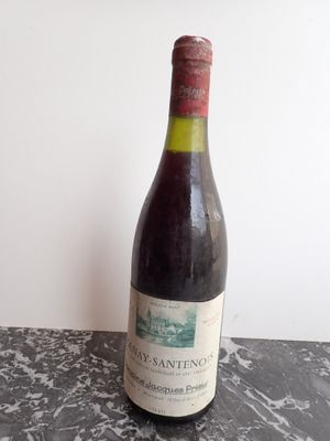a bottle of wine that is sitting on a table