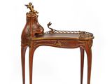 an image of a wooden table with a bird on it