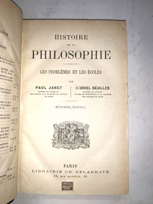 a book opened on a table with a picture of a building